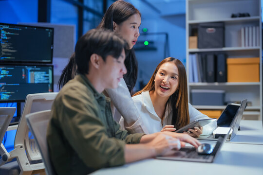 Professional computer engineer working on a new software technology design in the office Night, focus or programmer review search engine process, software or IT database development