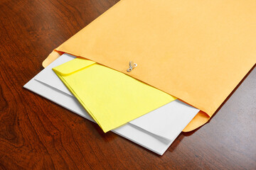 Manila envelope and stationary on desktop