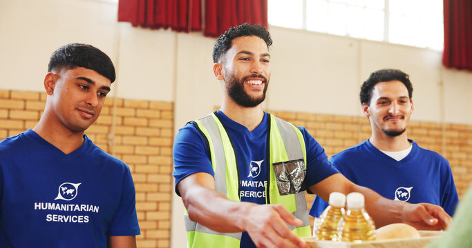 Food bank, volunteer and happy men with donation for help, nonprofit or community outreach. Charity, group or giving grocery for humanitarian aid, assistance or distribution for poverty relief at ngo - Powered by Adobe