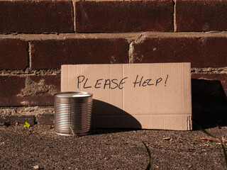 Please help sign with tin can for money donations