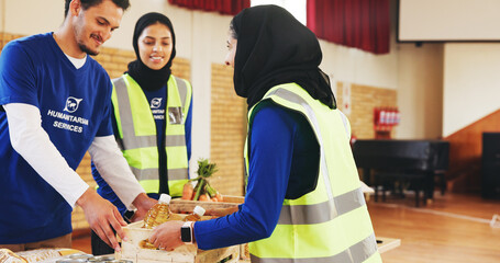 Food drive, volunteer and people with donation for help, non profit or community outreach. Charity, happy group and giving grocery for humanitarian aid, assistance or distribution at ngo with crate