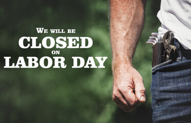 Signboard with the inscription We will be closed on Labor Day. Congratulations for family, loved...