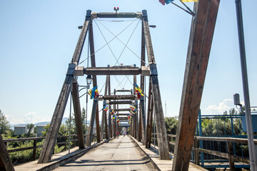 Architectural view of the Solotvyno Friendship Bridge, a vital link across the Tysa River, connecting Ukraine and Romania, a symbol of cross-border connection