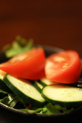 A tomato and cucumber salad.