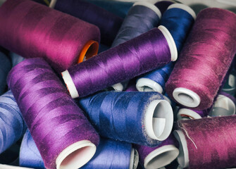 A Collection of Colorful Sewing Thread Spools