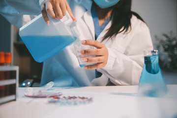 Research, experiment and medical trial being done by a scientist in a lab, science facility or...