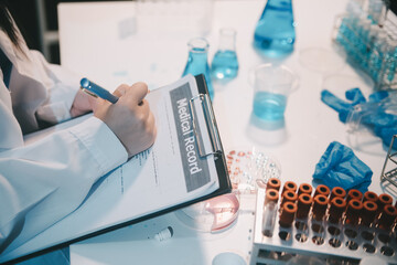 Research, experiment and medical trial being done by a scientist in a lab, science facility or...