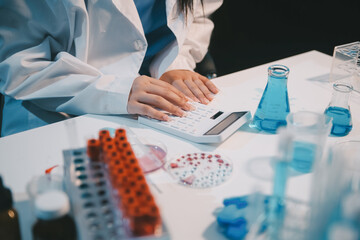 Research, experiment and medical trial being done by a scientist in a lab, science facility or...
