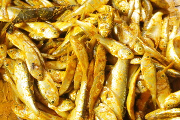 Crispy fried fish with golden-brown coating and tender, flavorful meat, perfect for seafood lovers, served hot with sauces or side dishes