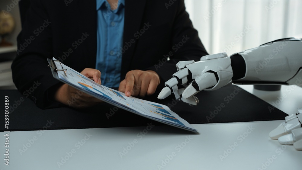 Poster a human and a robot collaborate on data analysis in a modern office setting. the robot hand gestures