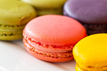 Colorful macaron on white dish