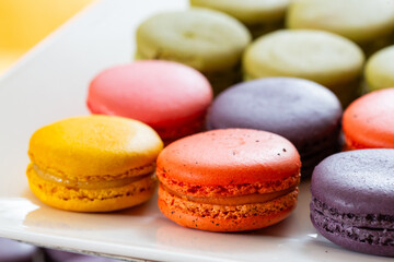 Colorful macaron on white dish