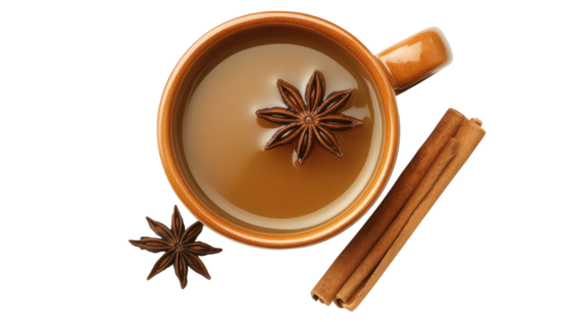 Top-down view of spiced apple cider in a mug with star anise and cinnamon stick isolated on transparent background 