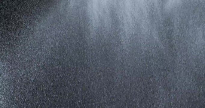 4k Rain over black background, realistic rain can be use in your composition, Rain hits the ground effect, Splashing rain