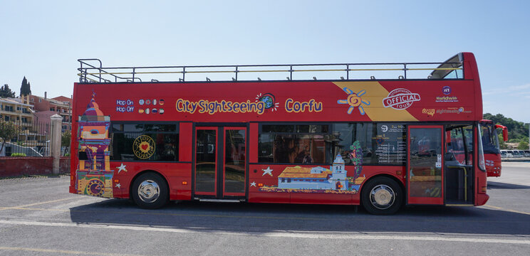 Kerkyra, Corfu, Greece- May 9, 2025: Visit Corfu: A tourist bus wait to take tourists on a guided tour of Corfu