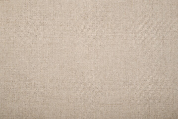 Texture of beige linen fabric. Natural background, close-up.