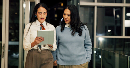 Business, night and women in office, tablet and collaboration with research for article. Deadline,...