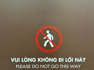 Vietnam, Nha Trang - 15.06.2025 - forbidden signs and placards in Vietnamese. Stop sign sign, you can't pass, people violate prohibitions in the city, information signs in English