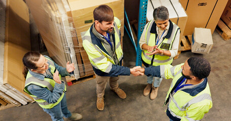People, handshake and team at warehouse for logistics, above and welcome for supply chain job. Men, women and circle with applause for promotion, celebration and group for shipping at storage plant