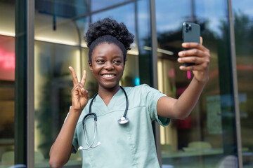 Smiling african american woman having a video call and looking happy