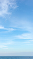 Obraz premium Fantastic soft white clouds against blue sky background.