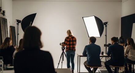 A photography class in a studio with students.