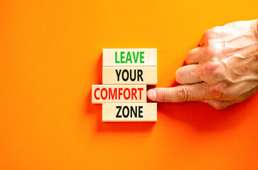 Leave your comfort zone symbol. Concept words Leave your comfort zone on beautiful wooden blocks....