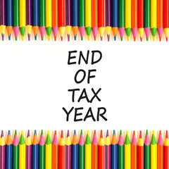 End of tax year symbol. Concept words phrase End of tax year on beautiful white paper. Colored...