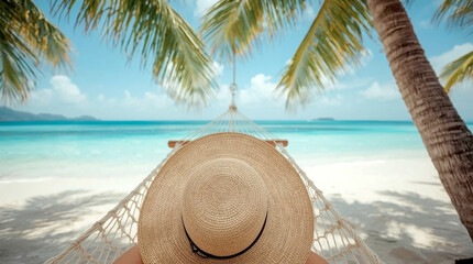Traveler woman relax in hammock on summer beach, person is relaxing in a woven rope hammock strung between palm trees on a sunny tropical beach. The person is seen from the waist up