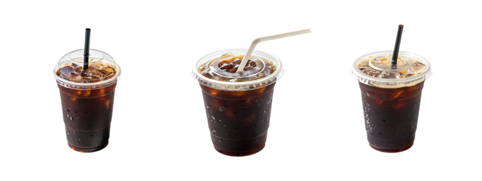  Three cold soft drinks with ice and straw in transparent cups