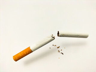 broken cigarette on light background
