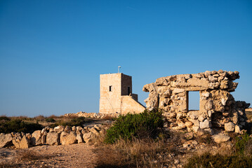 Malta, Gozo remains of a dilapidated building, a wall with a window and a watchtower