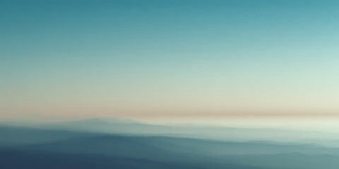 Abstract landscape with soft blue sky and blurred horizon line in a calming and peaceful scene