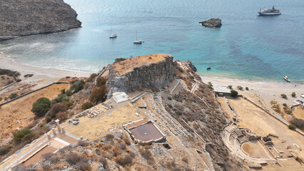 Aerial drone photo of archaeological seaside site of ancient Karthaia featuring Doric temple of Pythian Apollo, theatre and crystal clear beach of Polles in island of Kea, Aegean Sea, Cyclades, Greece
