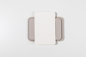 Minimalist Card and Leather Case on White – Mockup for Stationery Design