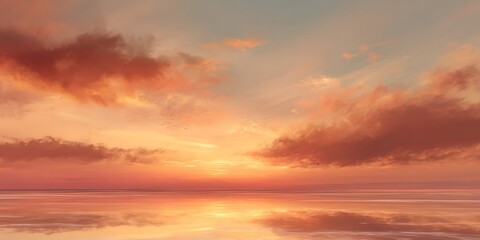 A beautiful sunset reflecting on the water with orange and pink clouds in the sky above the horizon