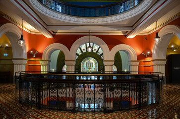 Elegant historic building interior with stained glass and intricate details