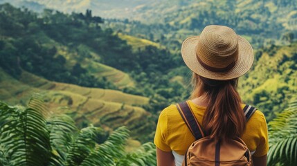 Exploring lush landscapes, a traveler admires expansive vistas from a high vantage point, surrounded by verdant greenery and natural beauty under a clear sky.