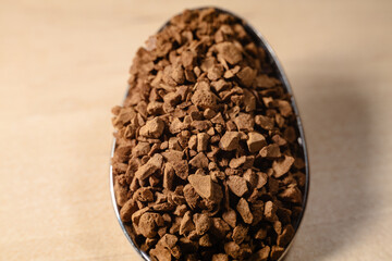 Aromatic Instant Coffee Granules on Spoon Macro Close Up