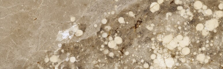Breccia marble texture background with beige and light brown clusters and natural cracks