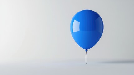 Obraz premium Single blue balloon against white background (1)