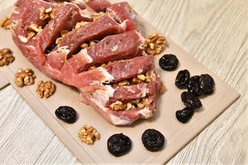 Raw Pork stuffed with walnuts and prunes