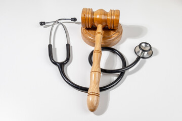 Legal Accountability in Healthcare – Gavel and Stethoscope On White Surface