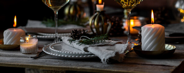 Banner. Elegant decor for Christmas family dinner. Center piece with burning candles, vintage...