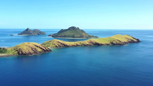 Fiji islands aerial flying scenic panorama of tropical resorts and coral reefs as 4k.
