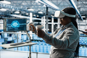 Server room worker using VR gear to accelerate complex AI calculations. Data center engineer using virtual reality technology to analyze datasets, managing infrastructure systems