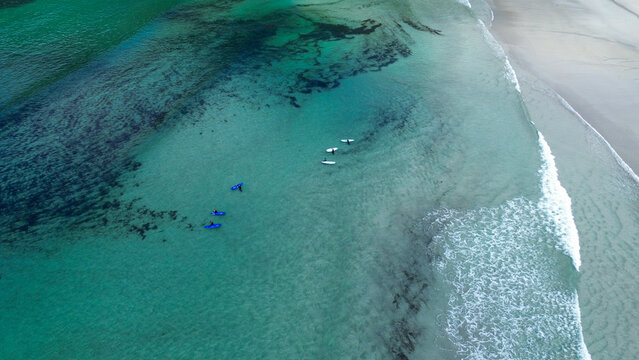 Aerial of Surfer on Sand and Gentle Wave Lines, Hoddevik