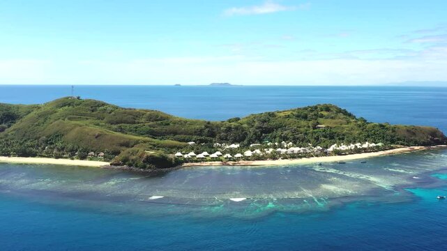 Coral reefs around Tokoriki island in Fiji Pacific ocean &ndash; aerial panorama as 4k.
