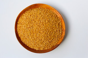 Organic golden flaxseeds, rich in omega-3, fiber, and antioxidants
