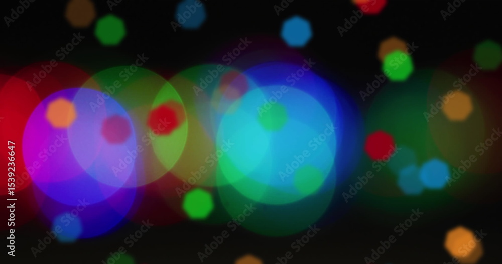 Aufkleber showing overlapping colored light circles dancing across black background, with abstract bokeh